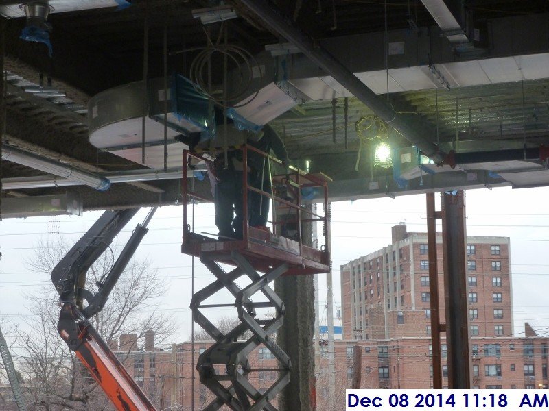 Installing ductwork at the 2nd floor Facing South